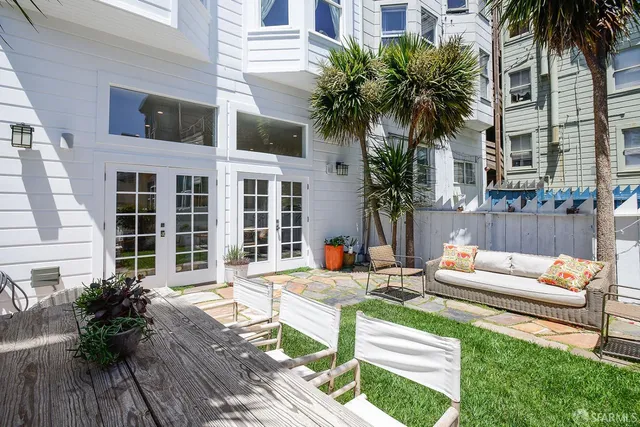 a room with furniture and flowers