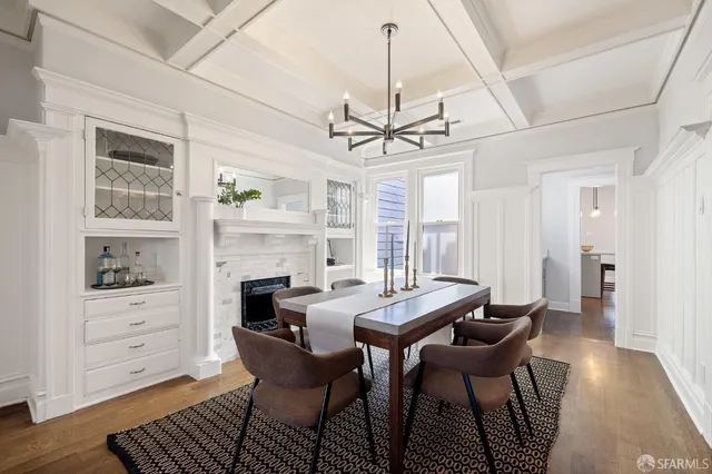 a bedroom with a bed and a chair in it