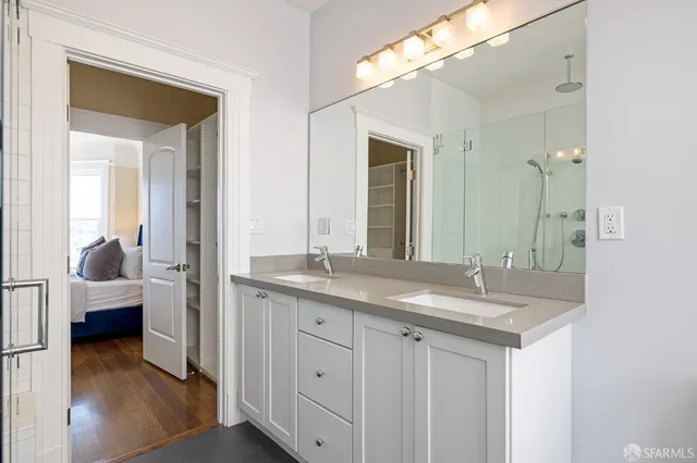 a kitchen with center island and stainless steel appliances