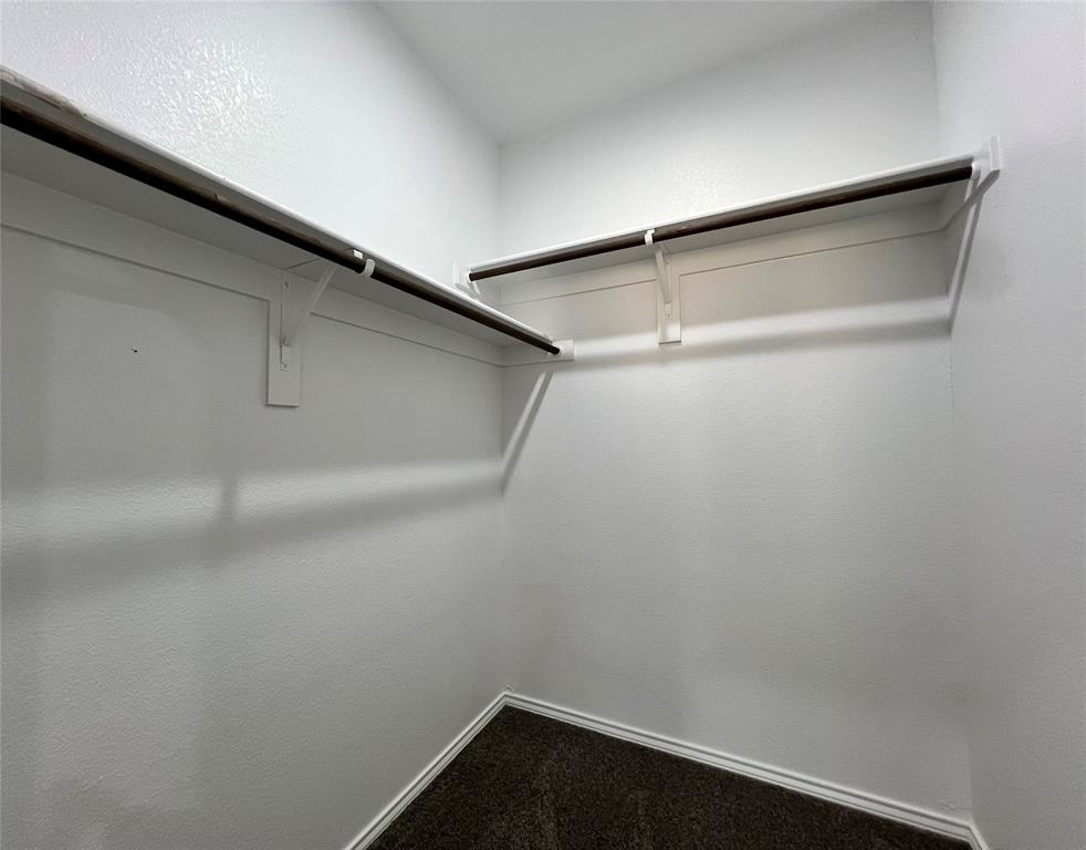 3501 East Renfro Street, Unit 120 Burleson, TX 76028 - Photo 19 of 30 a small space with wooden floor and closet