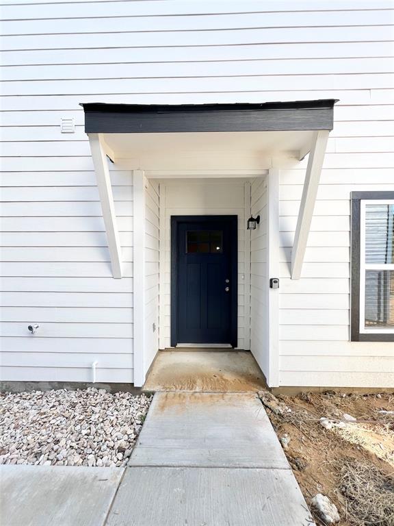 3501 East Renfro Street, Unit 120 Burleson, TX 76028 - Photo 3 of 30 a view of a house with a door