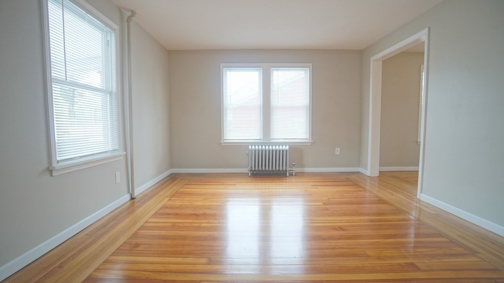 91 Pasco Road Springfield, MA 01151 - Photo 12 of 23 a view of empty room with wooden floor and fan