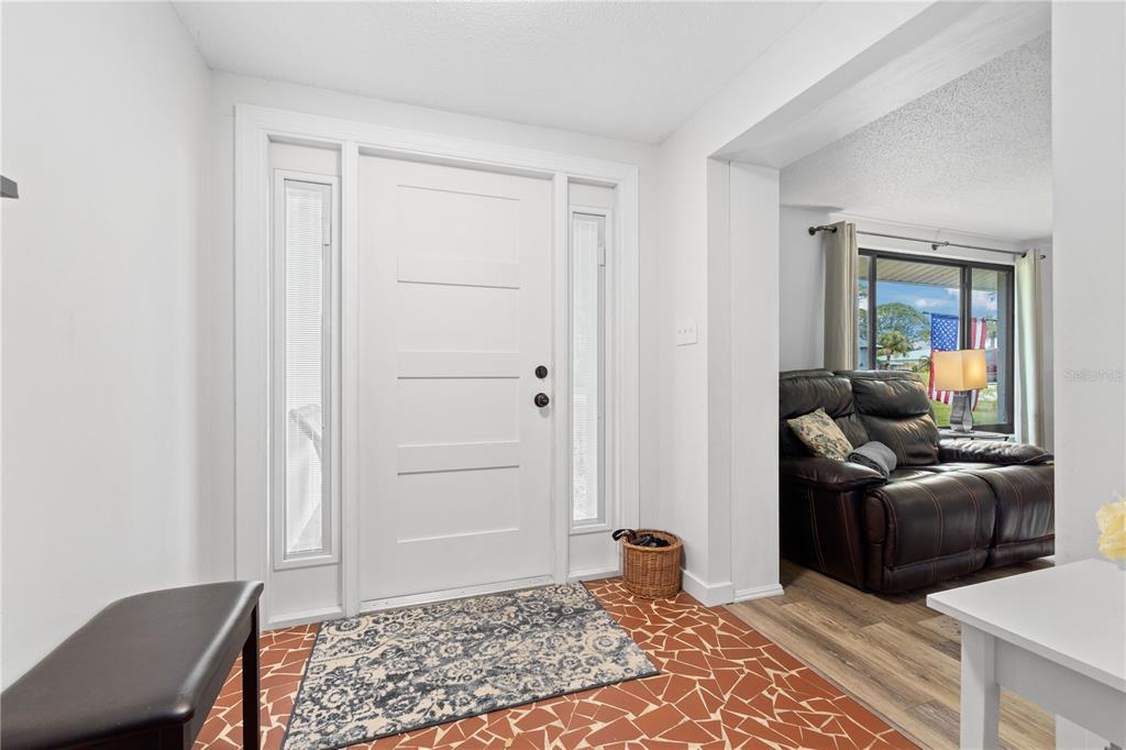 1481 Piedmont Road Venice, FL 34293 - Photo 4 of 52 All outdoor doors, windows ,sliding doors are new and hurricane proof