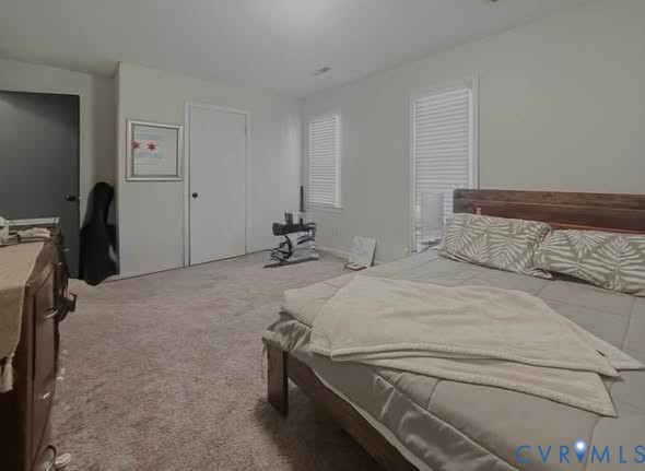 6009 Simplicity Court Chesterfield, VA 23832 - Photo 15 of 22 a bedroom with a bed and a desk in it
