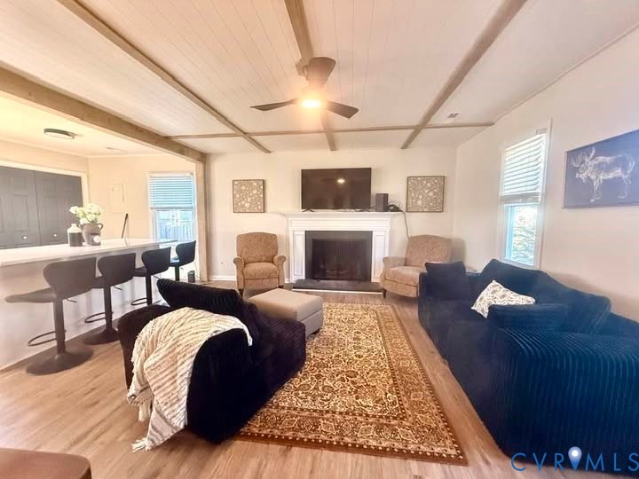 6009 Simplicity Court Chesterfield, VA 23832 - Photo 9 of 22 a living room with furniture and a fireplace