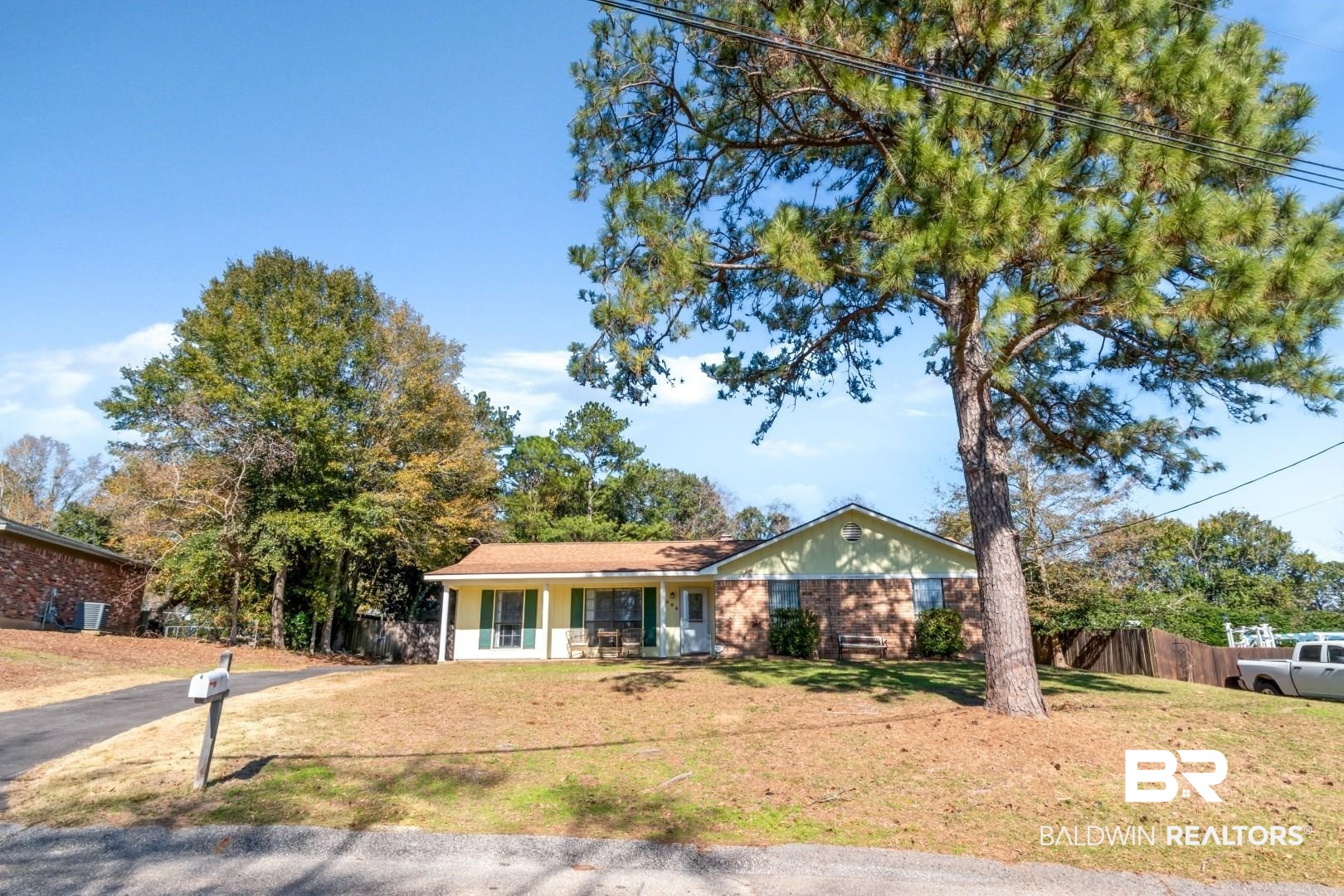 8304 Champlain Circle Mobile, AL 36695 - Photo 44 of 46 Single story home featuring covered porch and a front lawn