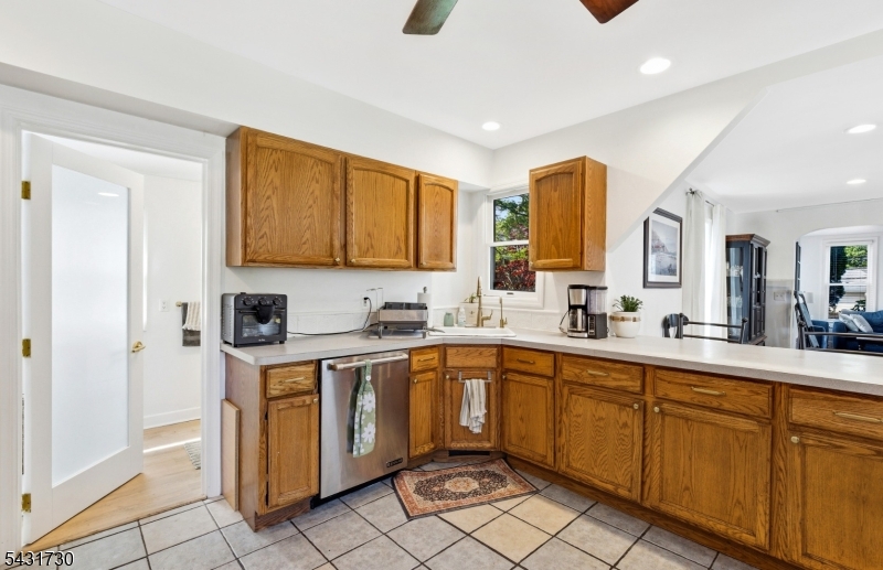 105 Main Street Lebanon, NJ 08833 - Photo 10 of 25 a kitchen with a sink window and cabinets