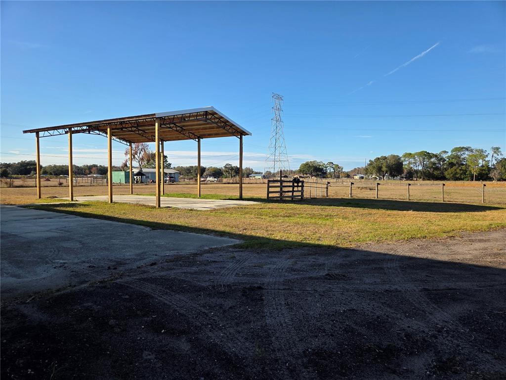 4901 North Vaughn Road Plant City, FL 33565 - Photo 29 of 31 a view of swimming pool with outdoor seating and yard in back