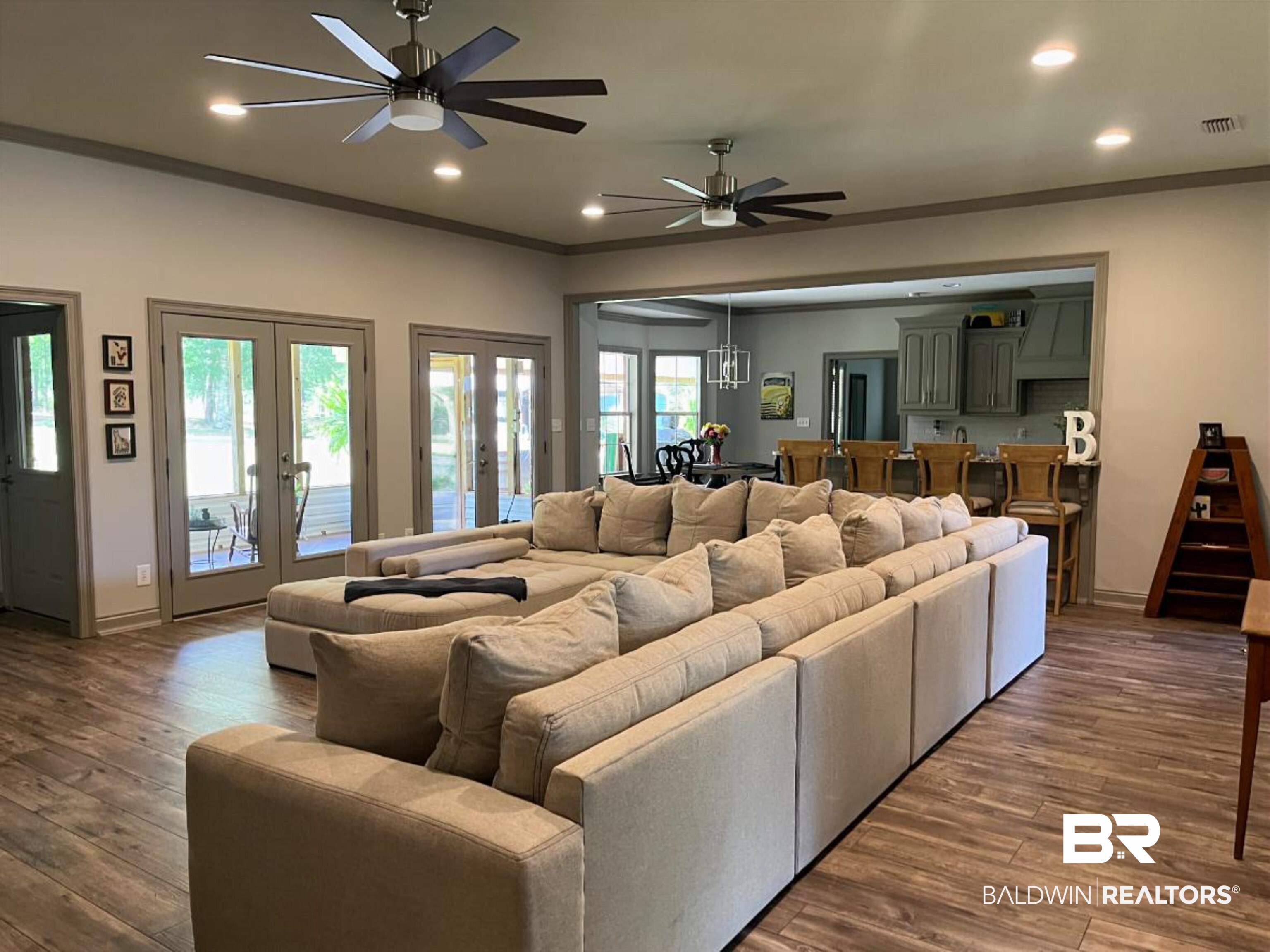 14316 Timber Ridge Drive Loxley, AL 36551 - Photo 9 of 23 Living area with recessed lighting, crown molding, ceiling fan, and wood finished floors