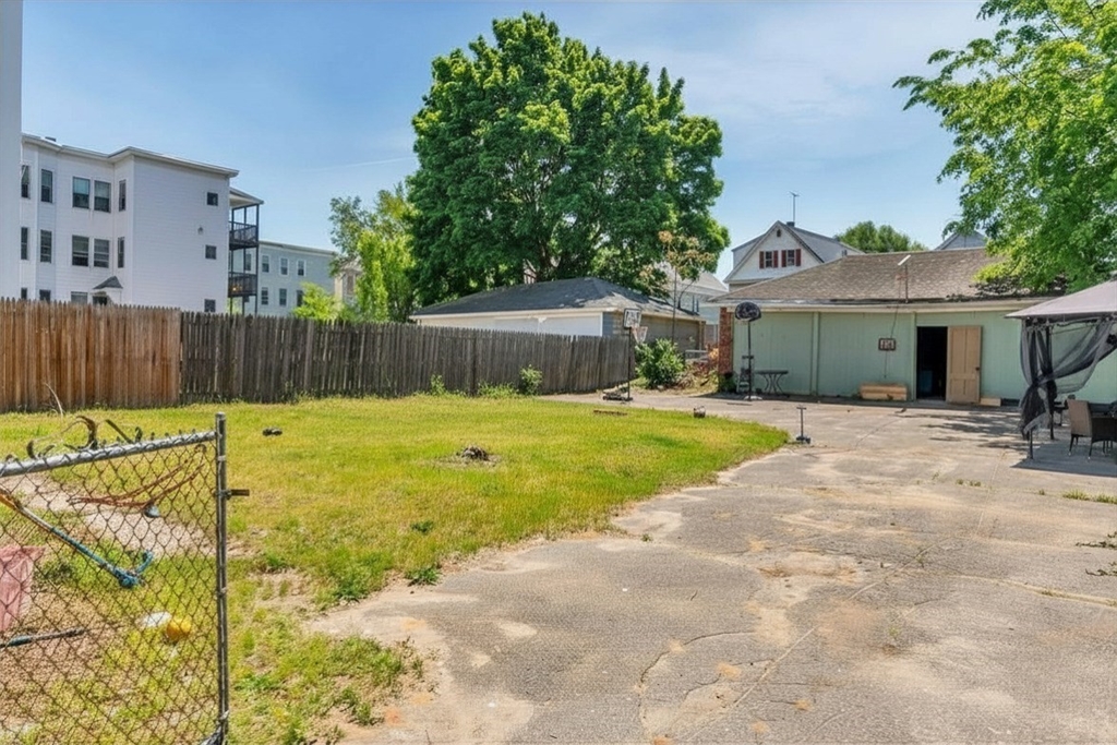 191 Farnham Street Lawrence, MA 01843 - Photo 2 of 31 a view of swimming pool with a backyard
