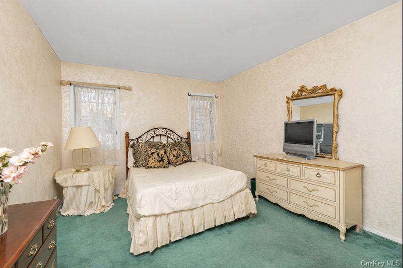 39 Fleets Cove Road Huntington, NY 11743 - Photo 16 of 20 Bedroom featuring carpet floors