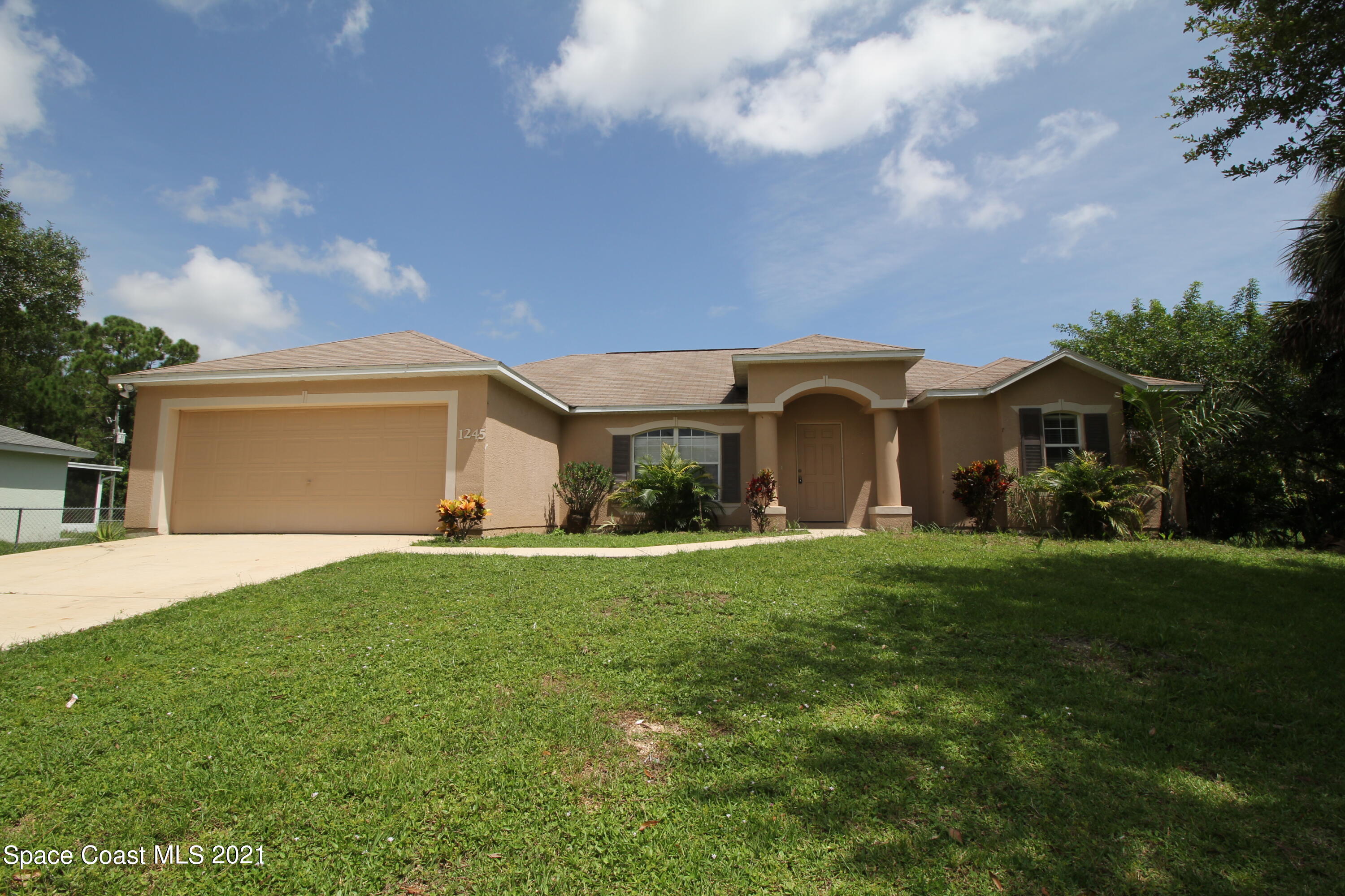 1245 Wakefield Road Southeast Palm Bay, FL 32909 - Photo 1 of 17 Front of house
