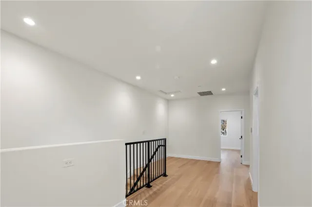 a view of hallway with stairs