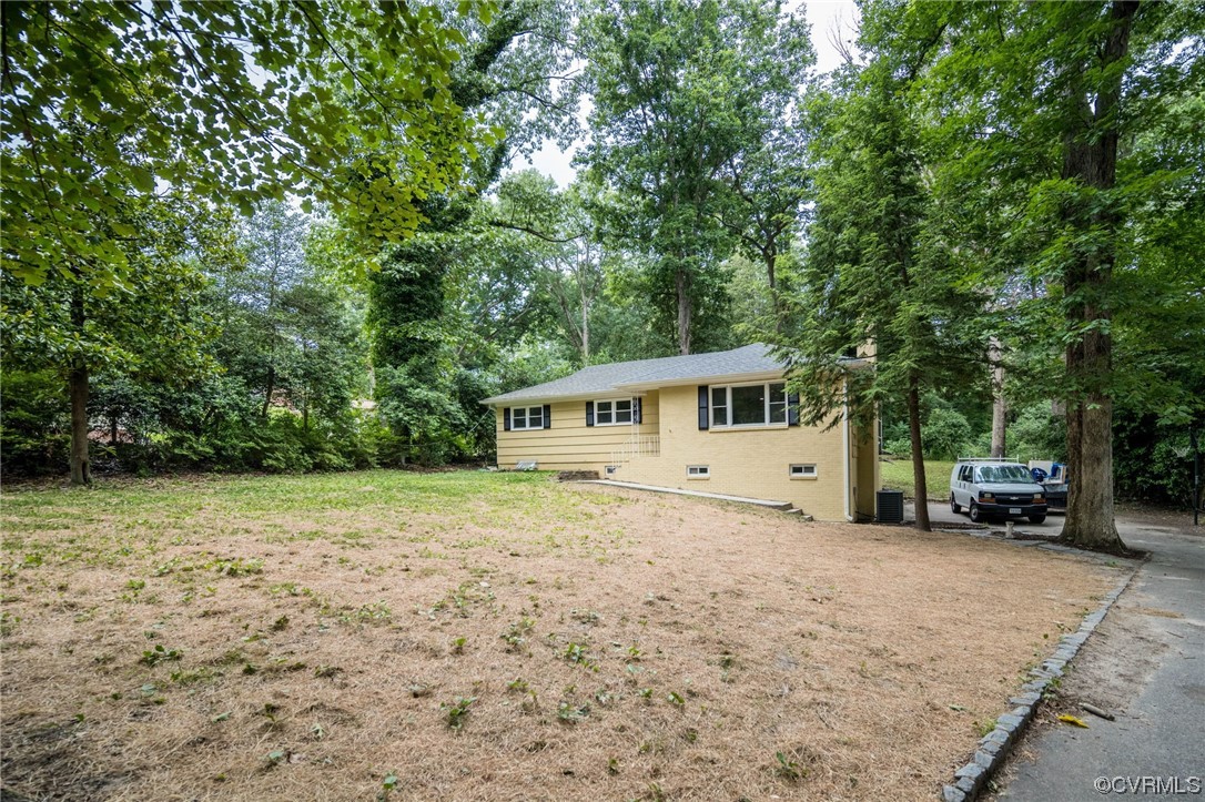 a house with trees in the background