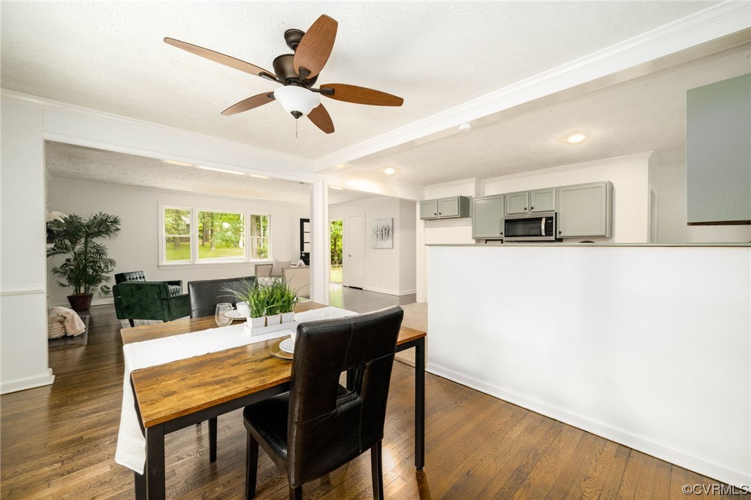 11824 Boyd Road Chester, VA 23831 - Photo 11 of 36 a view of a dining room with furniture and wooden floor