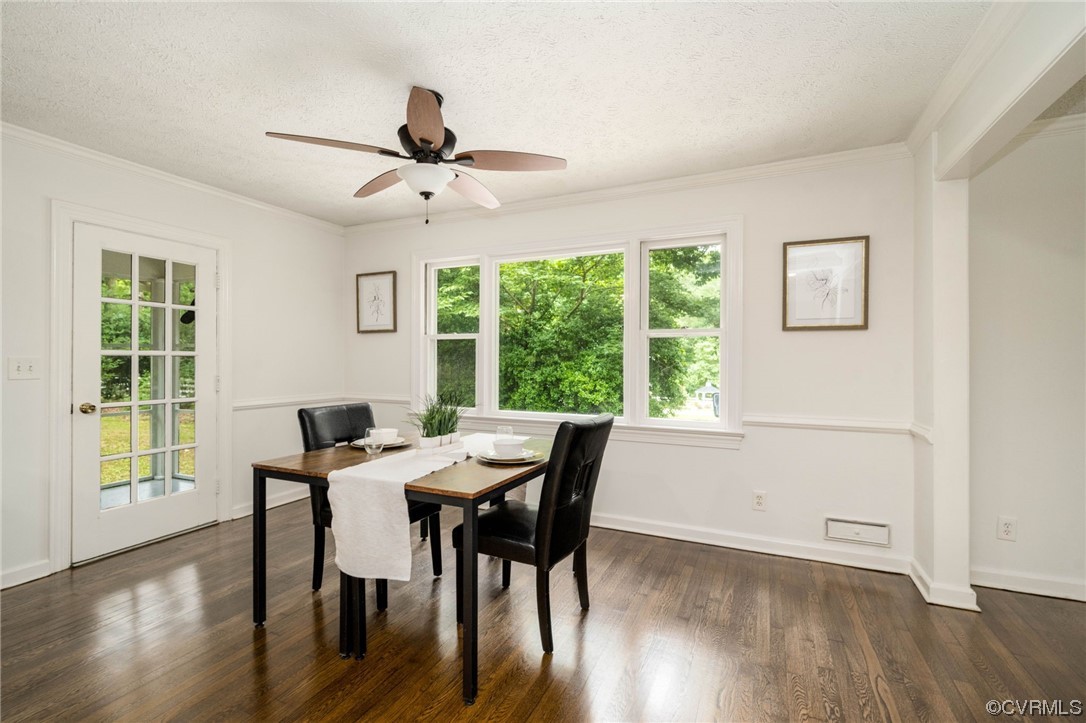 11824 Boyd Road Chester, VA 23831 - Photo 12 of 36 a view of a dining room with furniture window and wooden floor