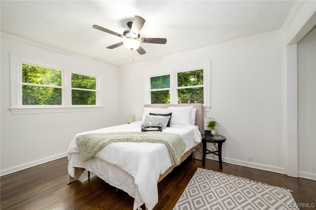 11824 Boyd Road Chester, VA 23831 - Photo 21 of 36 a bedroom with a bed and a window