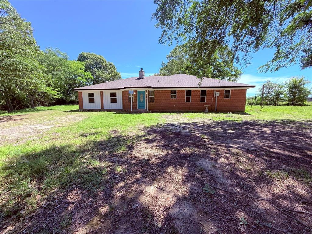 45 County Road 1197 Yantis, TX 75497 - Photo 1 of 26 a house view with a backyard space