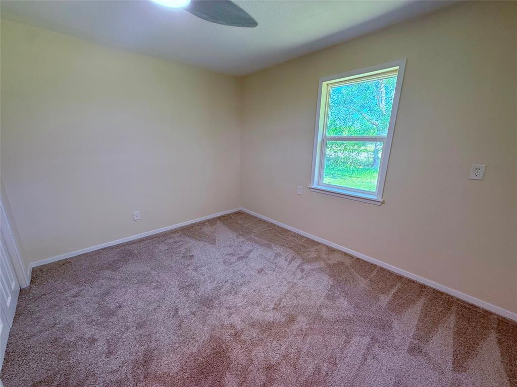 45 County Road 1197 Yantis, TX 75497 - Photo 22 of 26 an empty room with window