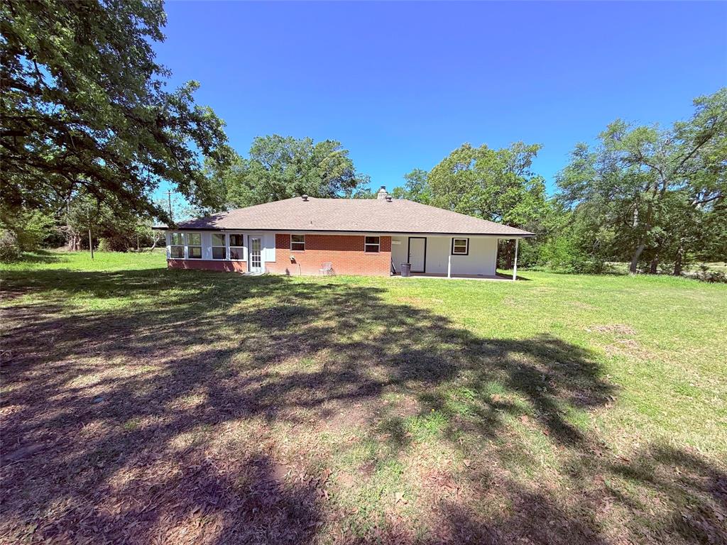 45 County Road 1197 Yantis, TX 75497 - Photo 23 of 26 a view of a house with yard and sitting area