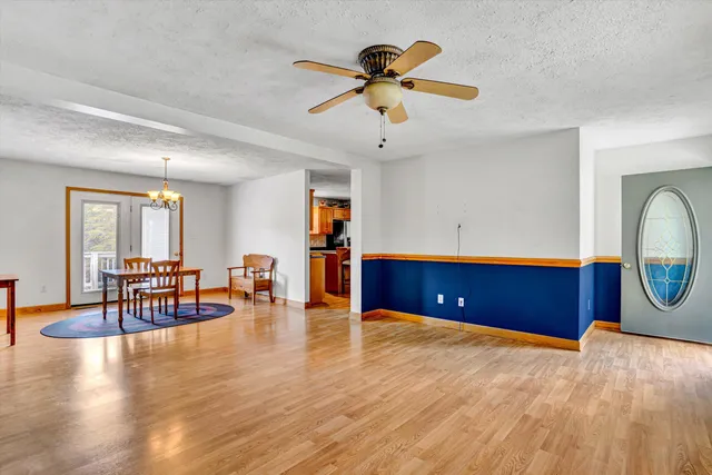 a living room with furniture and a table