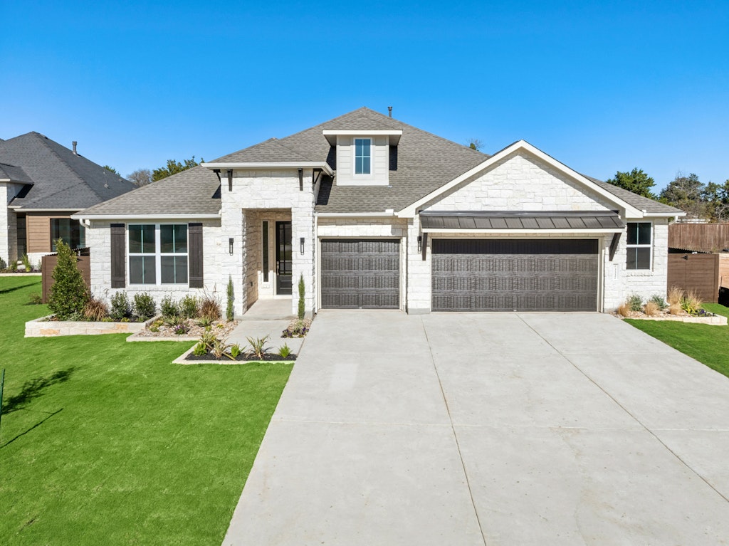 3332 Emerald Lake Path Georgetown, TX 78628 - Photo 2 of 35 front view of a house with a yard