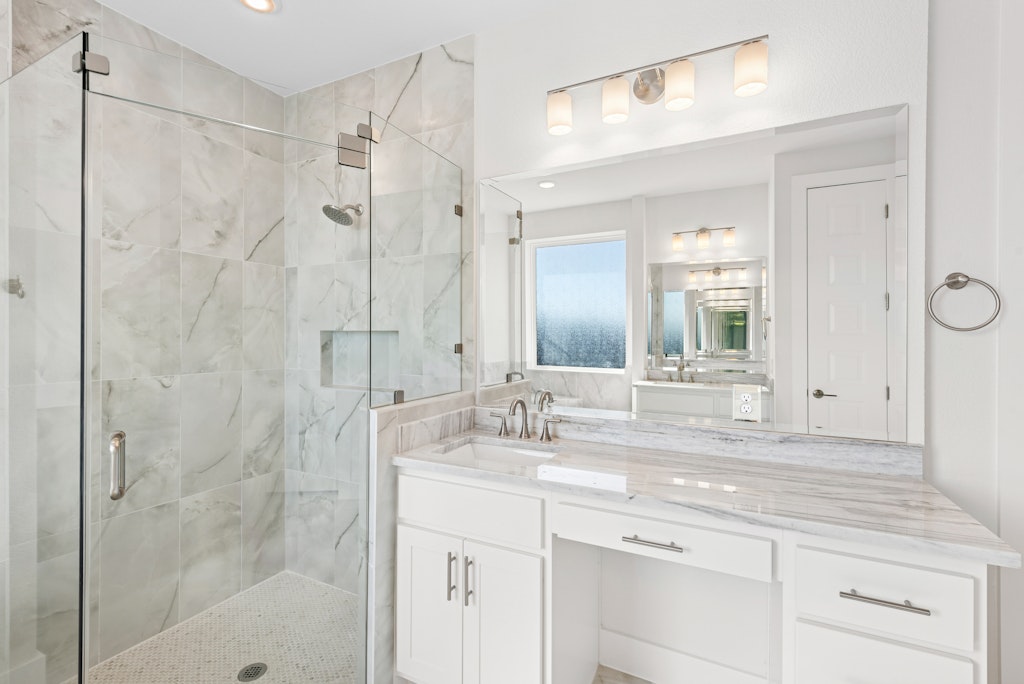 3332 Emerald Lake Path Georgetown, TX 78628 - Photo 21 of 35 a bathroom with a granite countertop sink mirror and double