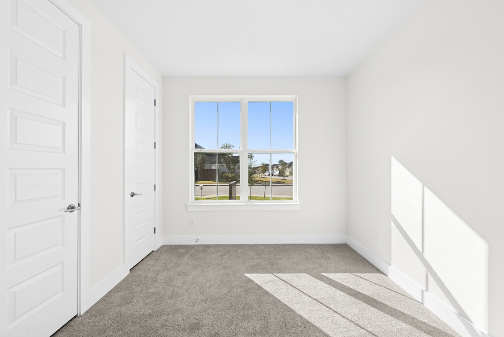 3332 Emerald Lake Path Georgetown, TX 78628 - Photo 26 of 35 a view of an empty room with a window