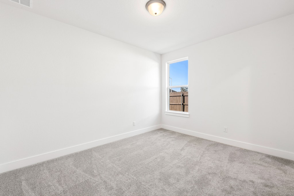 3332 Emerald Lake Path Georgetown, TX 78628 - Photo 28 of 35 a view of an empty room