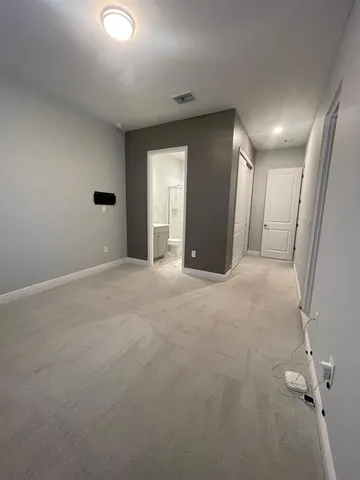 a view of a livingroom with a staircase