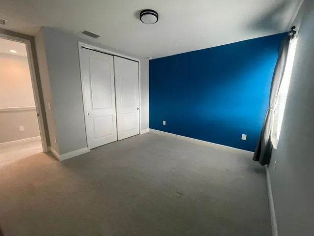 a spacious bathroom with a tub and shower