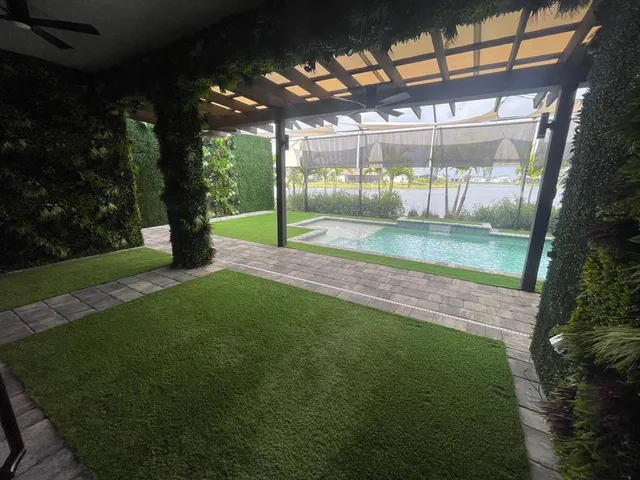 a view of a porch with a backyard