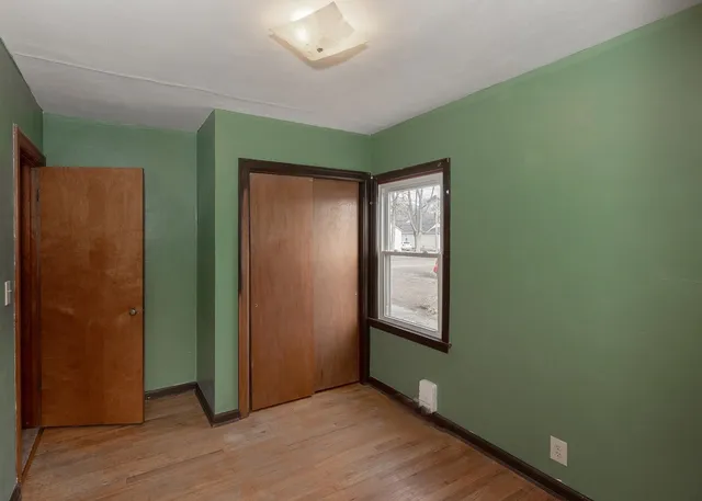 an empty room with windows