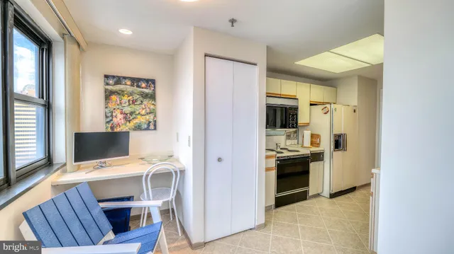 a view of kitchen and kitchen island