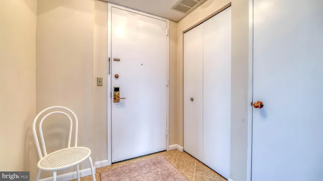 a view of an entryway with chandelier