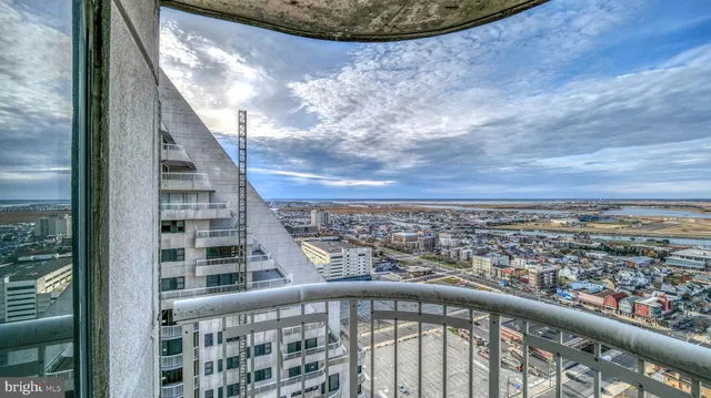 a view of a balcony with an outdoor space