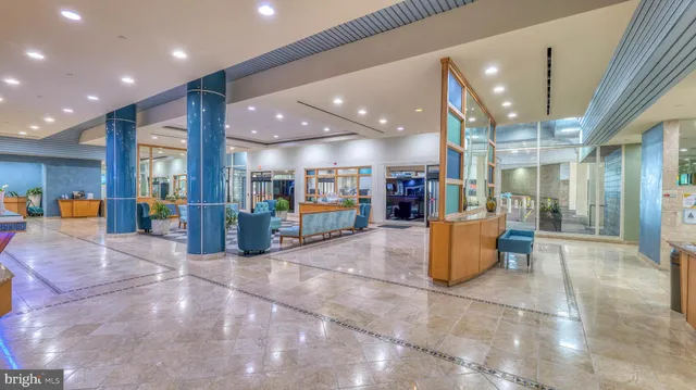 a view of an entryway with flower pots