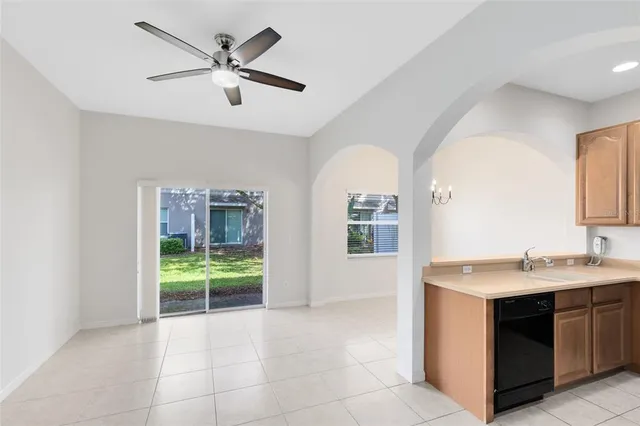 a kitchen with a sink and a stove