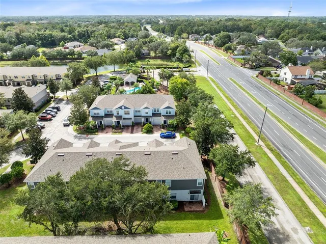 a aerial view of a house with plants