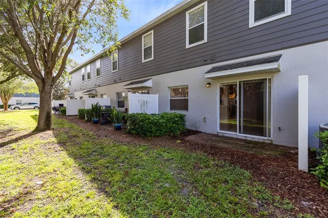 an aerial view of a swimming pool and outdoor space