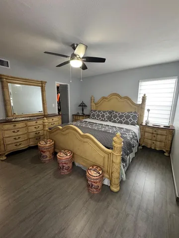 a bathroom with a tub and shower