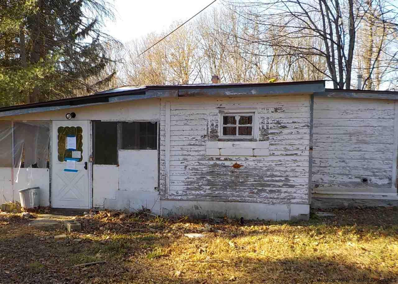 176 Beaver Road Red Hook, NY 12571 - Photo 1 of 12 a view of a house with a yard