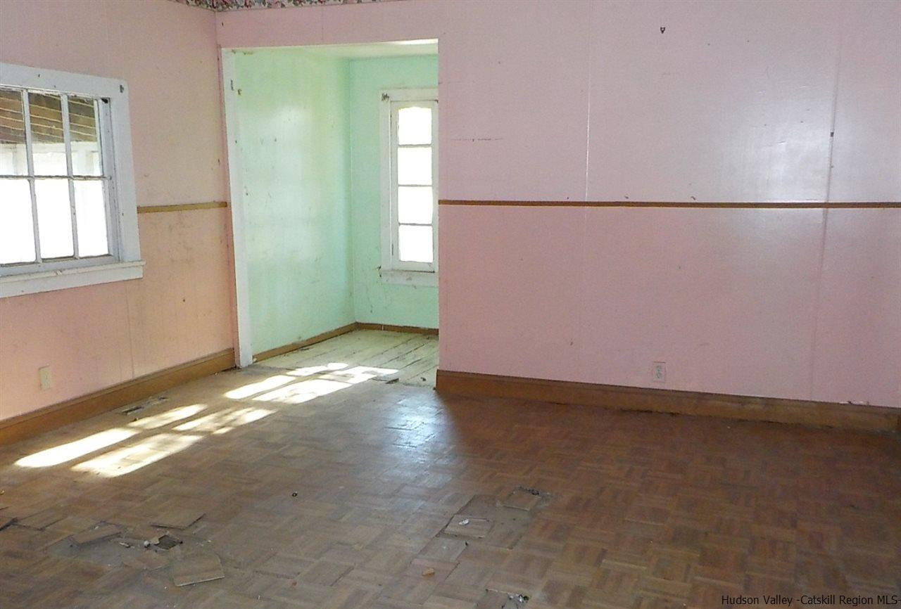 176 Beaver Road Red Hook, NY 12571 - Photo 4 of 12 an empty room with window