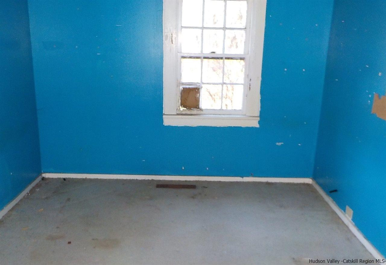 176 Beaver Road Red Hook, NY 12571 - Photo 6 of 12 an empty room with a window