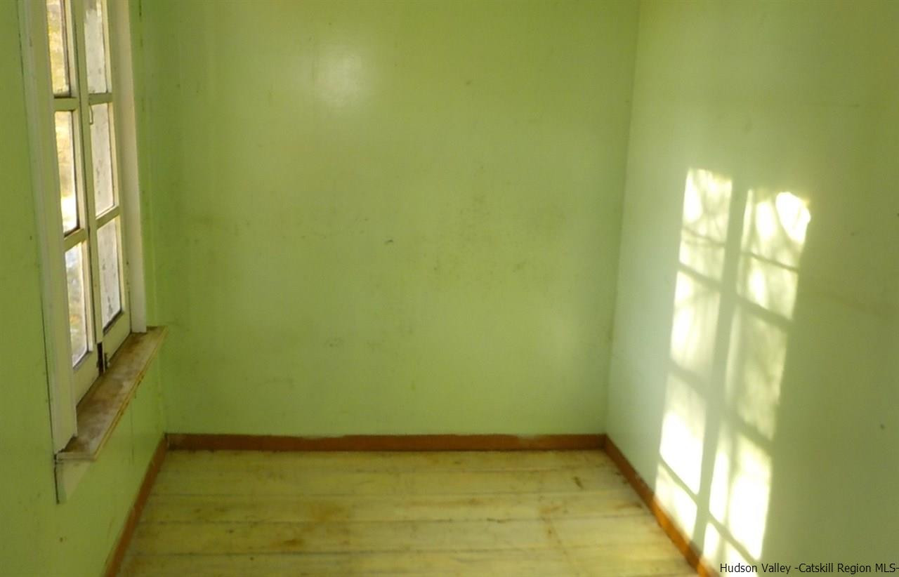 176 Beaver Road Red Hook, NY 12571 - Photo 7 of 12 a view of an empty room and window
