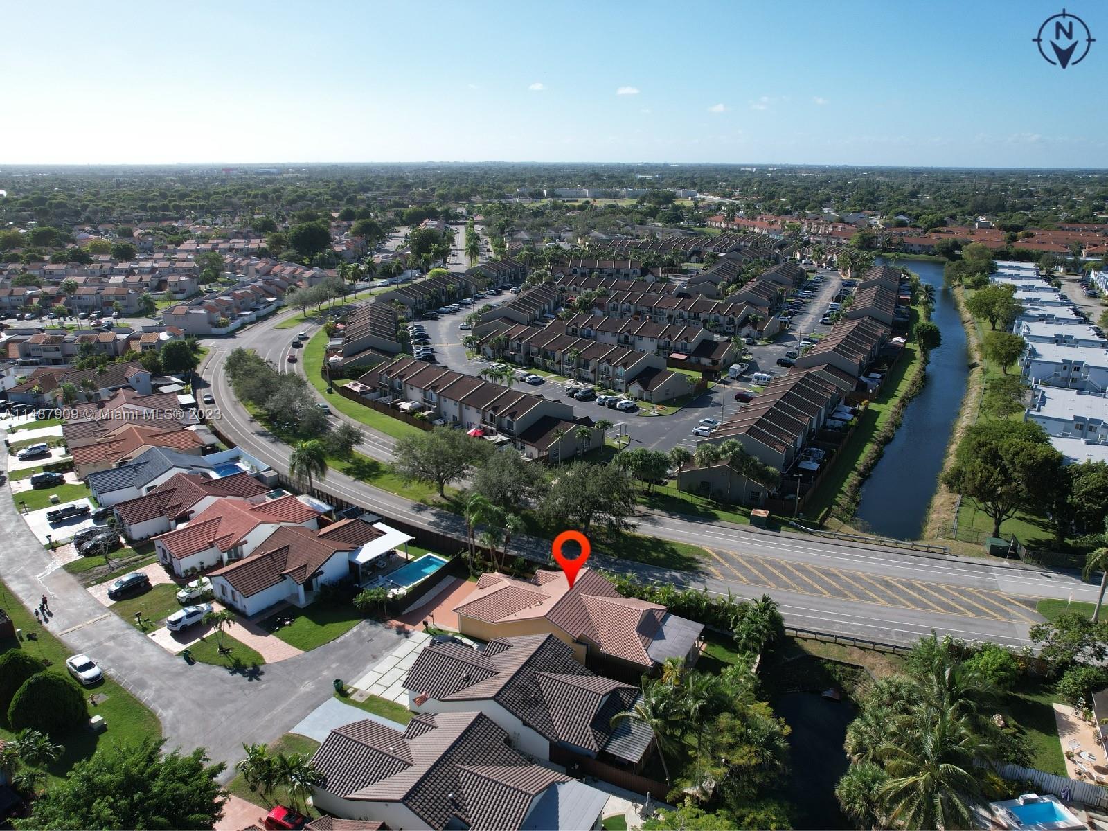 12913 Southwest 60th Street, Unit 12913 Miami, FL 33183 - Photo 15 of 17 an aerial view of residential houses with outdoor space
