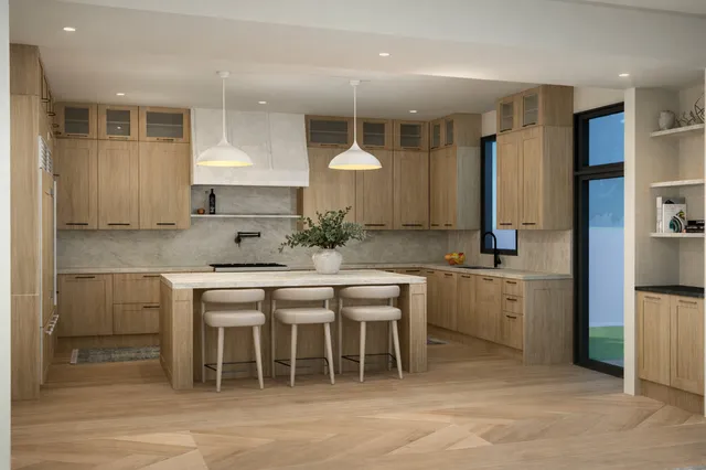 a kitchen with a sink cabinets and window