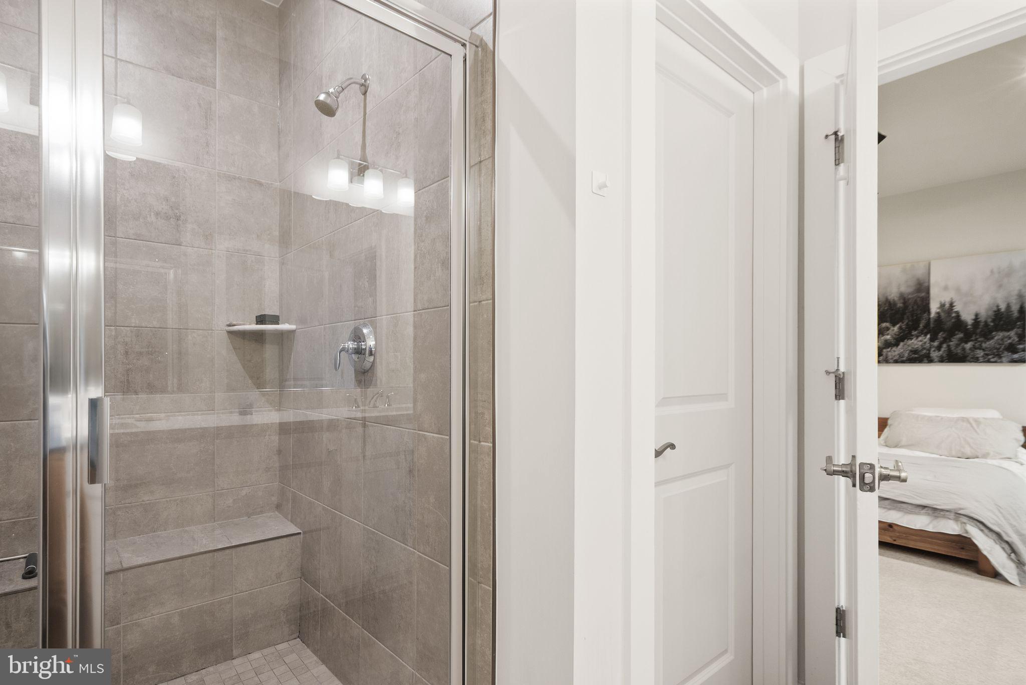 18353 Moss Garden Road Dumfries, VA 22026 - Photo 25 of 79 a bathroom with a shower