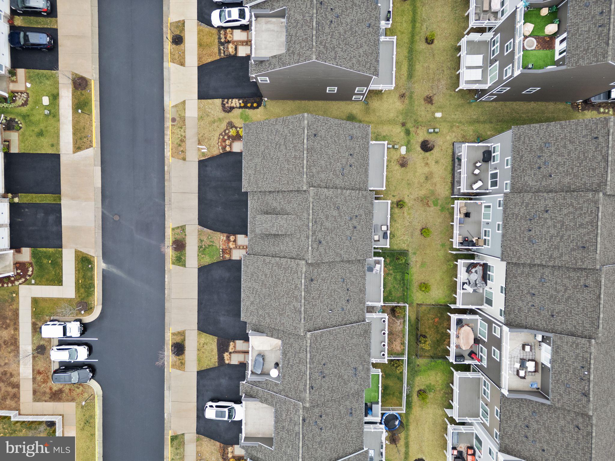 18353 Moss Garden Road Dumfries, VA 22026 - Photo 53 of 79 an aerial view of residential houses with outdoor space