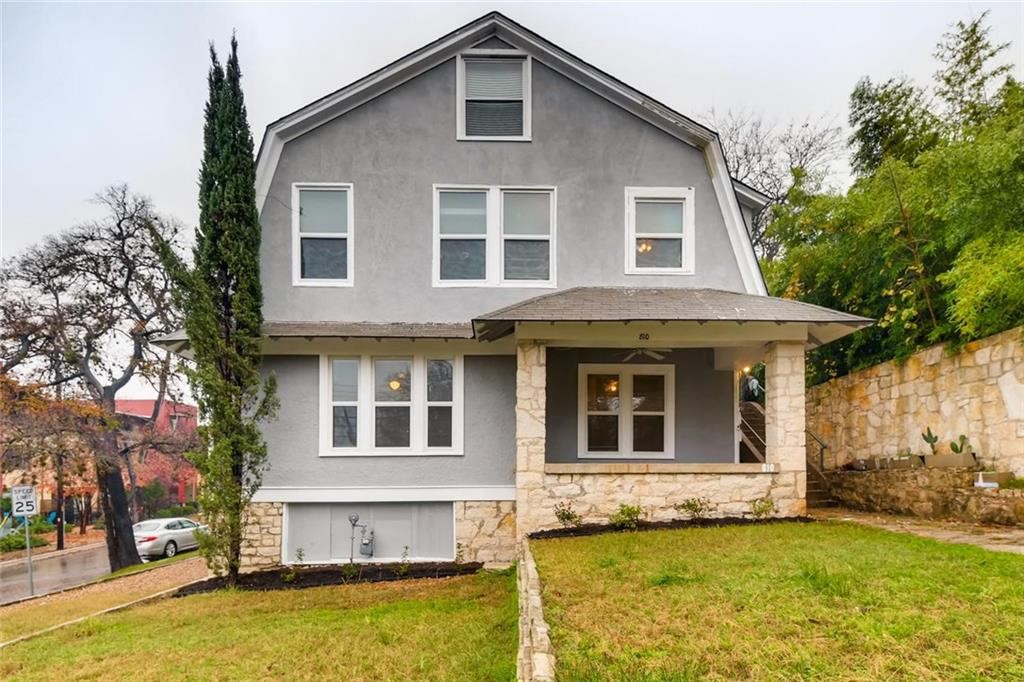 810 West 32nd Street, Unit B Austin, TX 78705 - Photo 1 of 1 a front view of a house with a yard